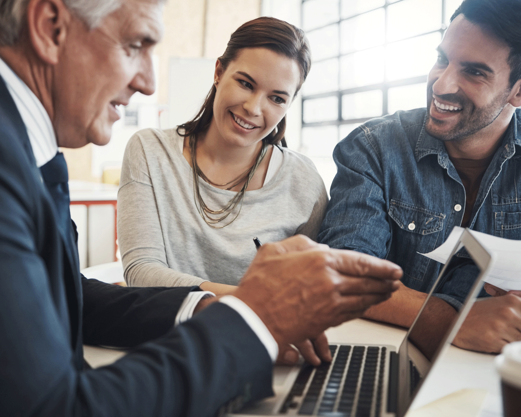 discussion-couple-financial-advisor-with-screen-consulting-insurance-plan-investment-office-advice-laptop-man-broker-with-people-meeting-loan-application-information-2
